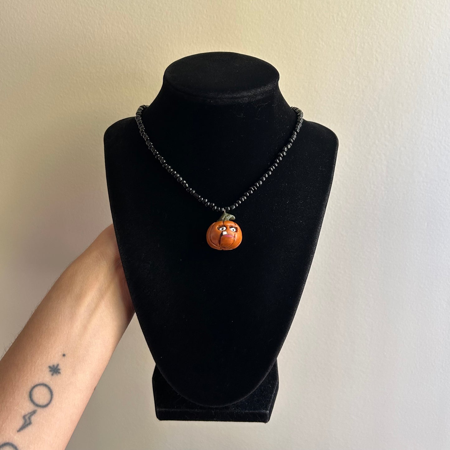 Goofy Toothy Pumpkin Beaded Necklace